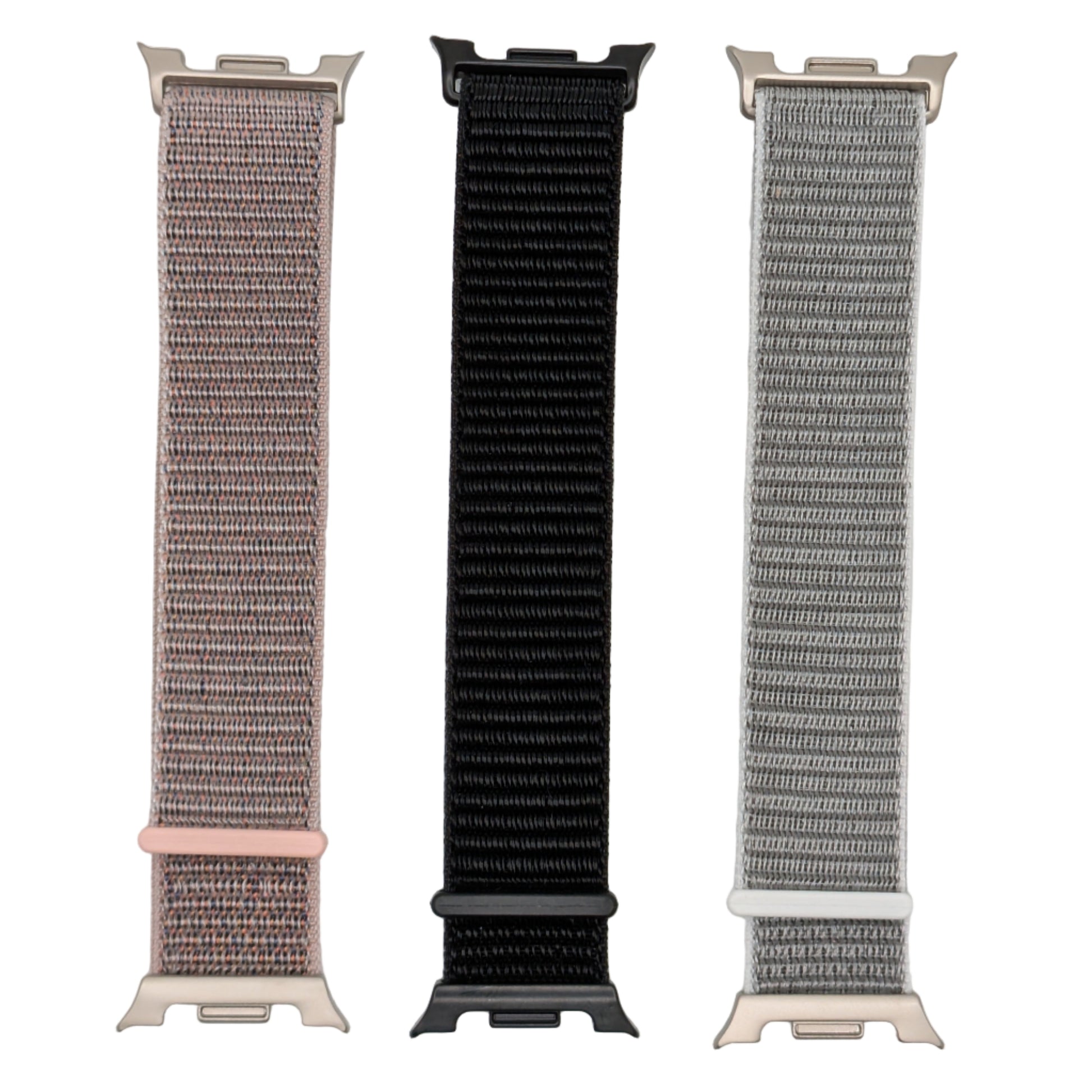 Three watch straps in different colors on a  white background