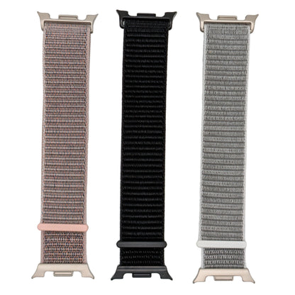 Three watch straps in different colors on a  white background