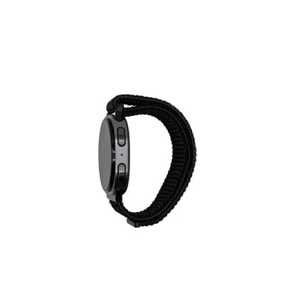 Smartwatch with a black band on a light gray background